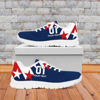 Blue and white soccer sneakers with red star print and white rubber sole.