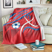 Red North Korea football blanket with blue diagonal stripe, text, soccer ball, and emblem