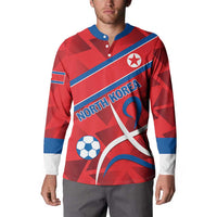 Red football button sweatshirt with blue trim and large North Korea front graphic