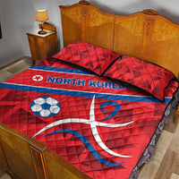 Red North Korea football quilt bed set with black trim, two pillows, soccer ball and emblem