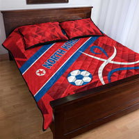 Red North Korea quilt bed set with two pillows, blue diagonal stripe and soccer ball design