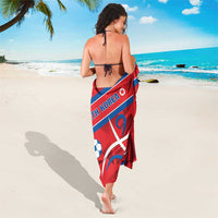 Red sarong with North Korea emblem, soccer ball print, and blue diagonal border
