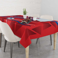 Red football-themed tablecloth with North Korea banner, soccer ball, and curved action graphic