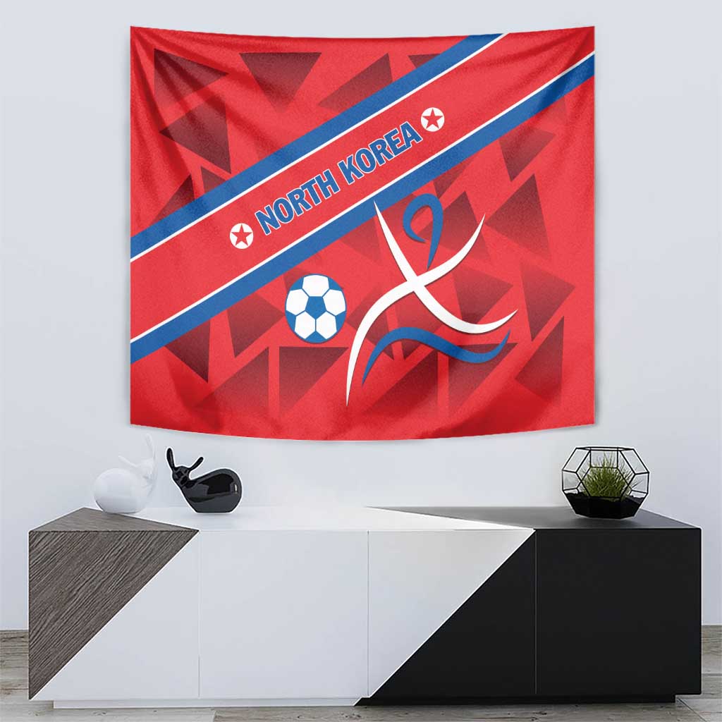 Red North Korea football tapestry with blue band, soccer ball, and swirling ribbon mark