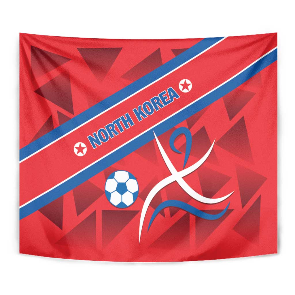 Red North Korea football tapestry with blue diagonal stripe, soccer ball, and curving emblem