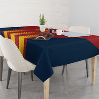 Spain football tablecloth in navy and red with yellow stripe graphic, covers dining table.