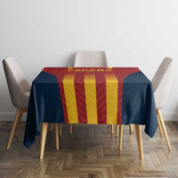 Spain football tablecloth with navy-red-yellow vertical stripe design on a round dining table.