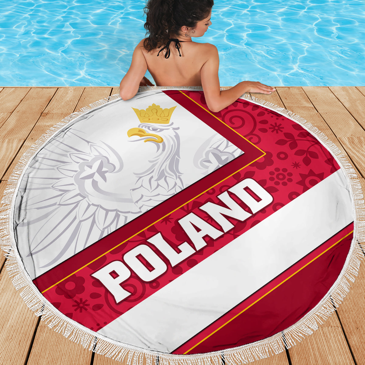 Round fringed beach blanket showing red Poland eagle floral center and POLAND text