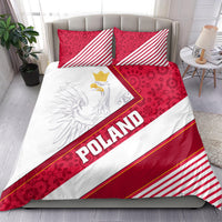 Poland bedding set: two red patterned pillows, white duvet with eagle crest and 'POLAND' text band