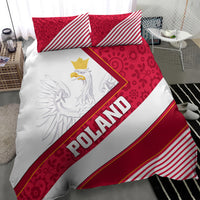 Poland bedding set: red floral pillows, white duvet with large eagle graphic and 'POLAND' diagonal band