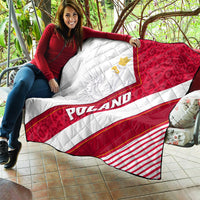Poland flag quilt held outdoors, diamond quilting with red crest and POLAND lettering