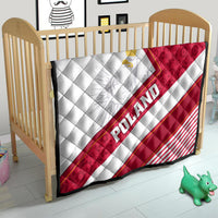 Poland flag quilt on baby bed, red and white flag design with POLAND lettering