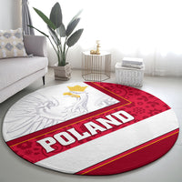 Round carpet in red and grey with white eagle design and 'POLAND' banner