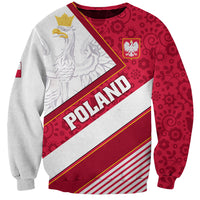 Unisex red and white sweatshirt with diagonal eagle crest and “POLSKA” text