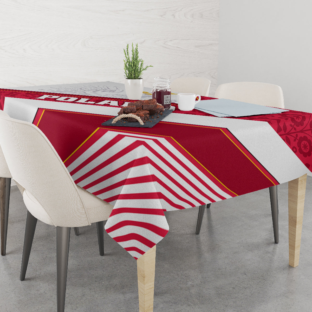 Red and white striped tablecloth draped over dining table