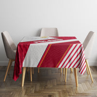 Red and white geometric tablecloth with diagonal stripe panel