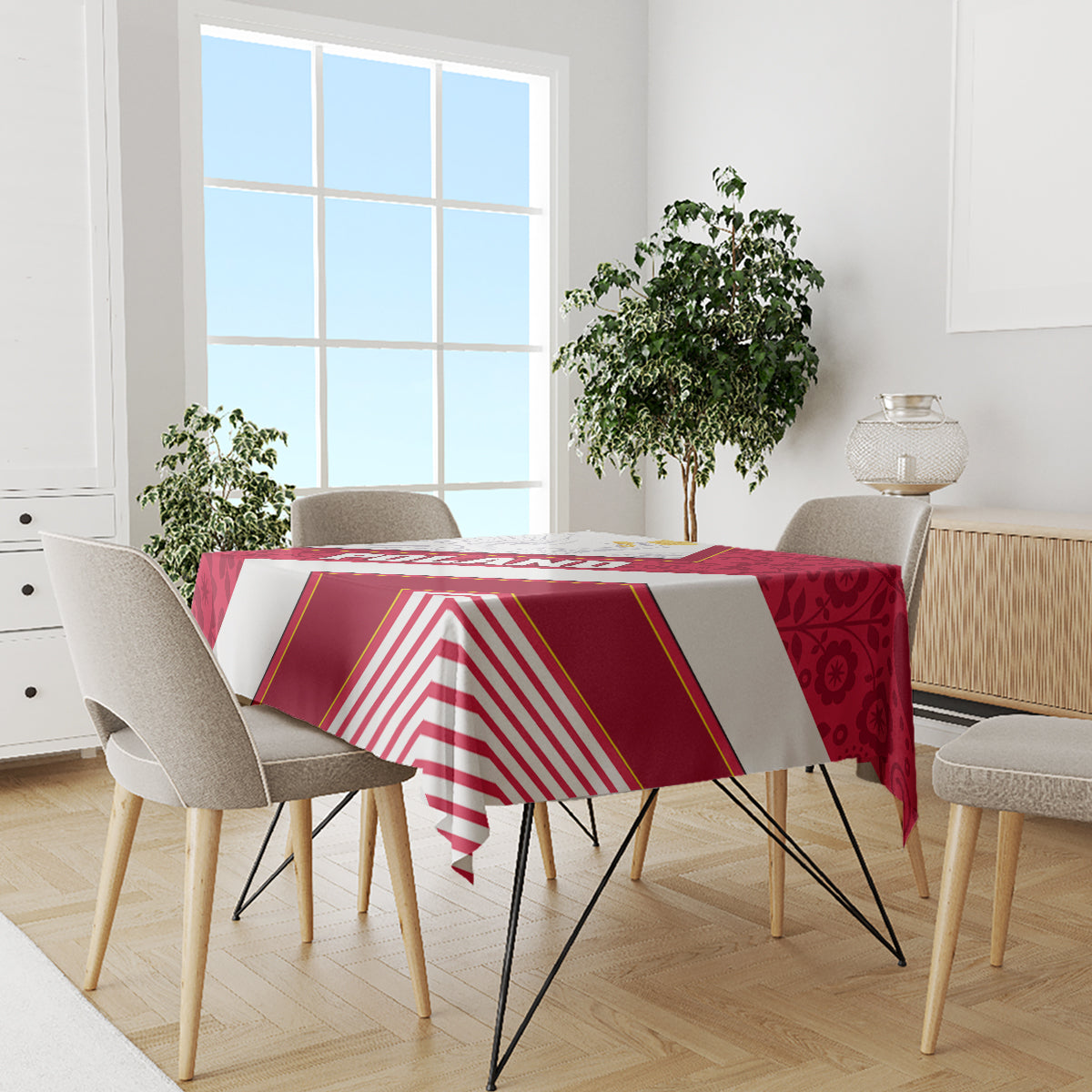 Red and white patterned tablecloth on dining table