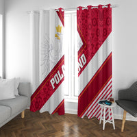 Full-length white and red curtain pair with diagonal emblem lettering and stripe accents