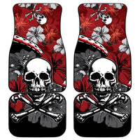 Red and black car floor mats with hibiscus flowers and skull crossbones graphic