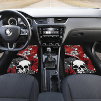 Red and black front car floor mats with hibiscus flowers, skull, and crossed-bone motif