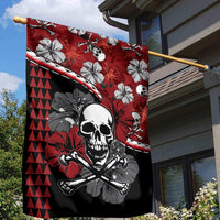 Red and black garden flag with large skull and crossbones and hibiscus flowers