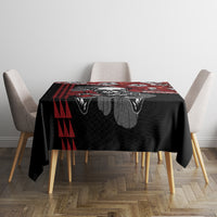 Square red and black hibiscus skull Halloween tablecloth on dining table with chairs
