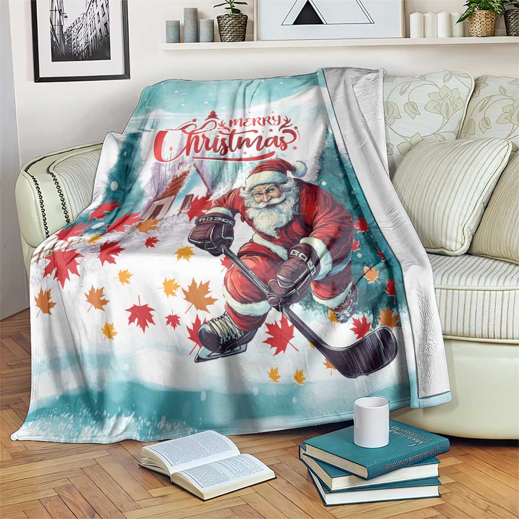 Teal Christmas blanket with Santa holding a gift sack and colorful fall leaves