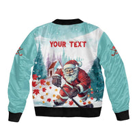 Mint bomber jacket back with 'YOUR TEXT', Santa playing hockey print, black rib trim