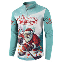 Mint button-up sweatshirt with centered Santa hockey artwork and Merry Christmas logo