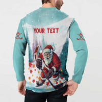 Mint button-up sweatshirt back shows 'YOUR TEXT' over Santa hockey artwork