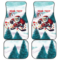 Mint car mats featuring Santa hockey, snowy pine trees, and red "YOUR TEXT" lettering