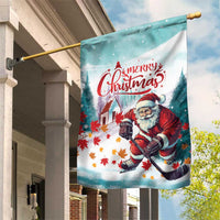 Mint garden flag with red Santa hockey and 'Merry Christmas' text