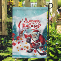 Mint garden flag with red Santa skating and 'Merry Christmas' lettering