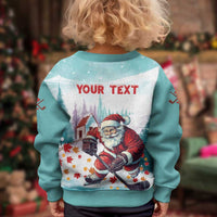 Kids mint sweater with Santa hockey graphic and 'YOUR TEXT' on the back