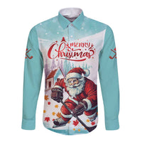 Mint long-sleeve button shirt with Merry Christmas hockey Santa front graphic