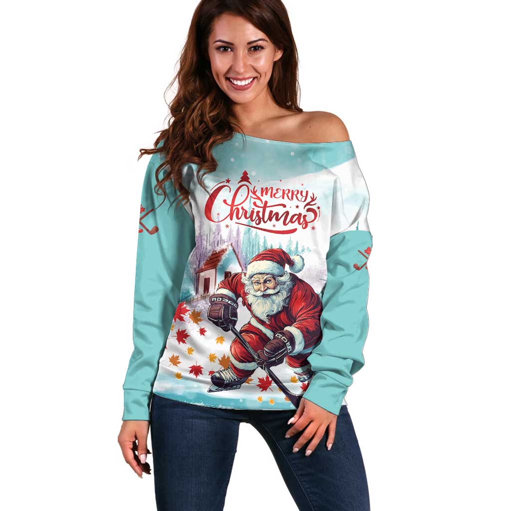 Mint off-shoulder sweater with Santa hockey and 'Merry Christmas' logo at chest