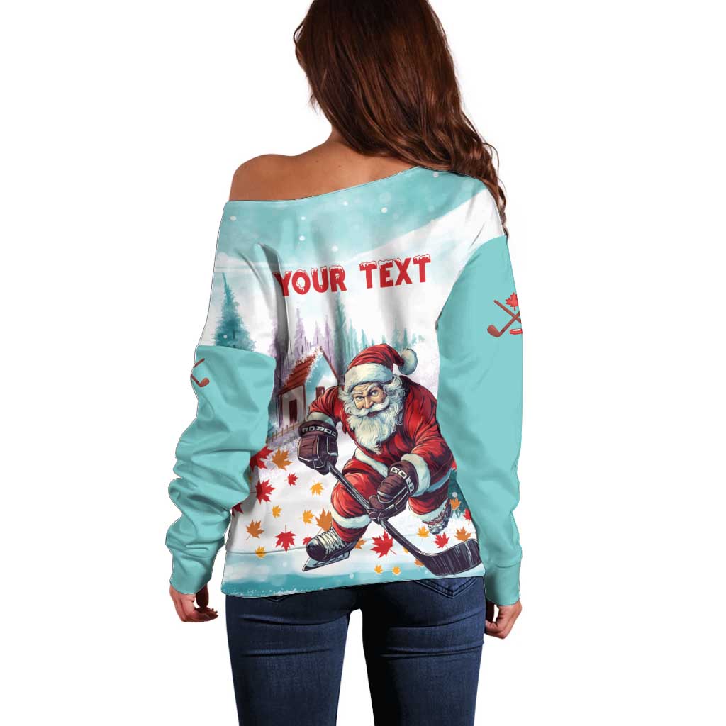 Mint off-shoulder sweater, Santa hockey graphic with 'YOUR TEXT' on back