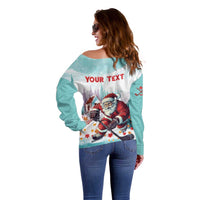 Mint off-shoulder sweater, Santa hockey and 'YOUR TEXT' graphic on back view