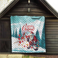 Mint quilt hanging on porch wall, Santa hockey art and 'Merry Christmas' lettering