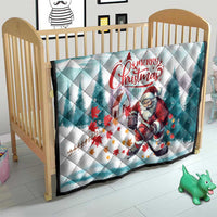 Mint Christmas quilt in crib, Santa playing hockey with 'Merry Christmas' on top