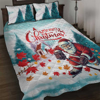 Mint quilt bed set with Santa playing hockey, leaf pattern and Merry Christmas lettering.