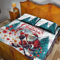 Mint quilt bed set with Santa playing hockey on an angled quilt face and two pillowcases.