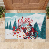 Mint rubber doormat with Santa playing hockey and 'Merry Christmas' text, rectangular