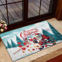 Mint rubber doormat on outdoor step, Santa playing hockey under 'Merry Christmas'