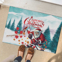 Mint rubber doormat with Santa holding hockey stick, 'Merry Christmas' headline