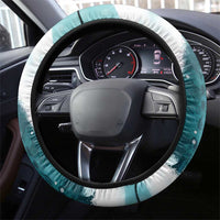 Mint steering wheel cover with black trim, frosty pattern, covering dashboard steering wheel