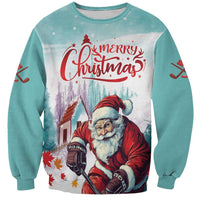 Mint crewneck sweatshirt with 'Merry Christmas' Santa hockey graphic