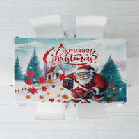 Christmas tablecloth with Santa and hockey skates, teal and red design on mint background
