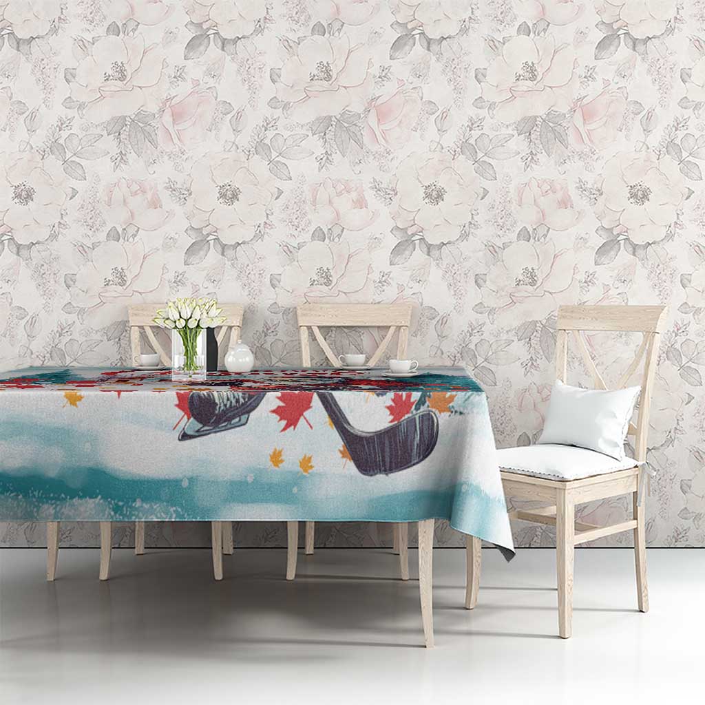 Christmas tablecloth featuring Santa and hockey skates, teal and red, over dining table