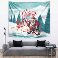 Mint Christmas tapestry with Santa playing hockey in a snowy forest scene